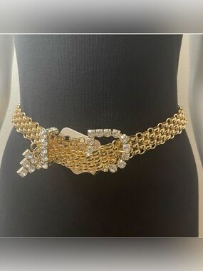 Gold tone metallic chained with rhinestones details skinny belt